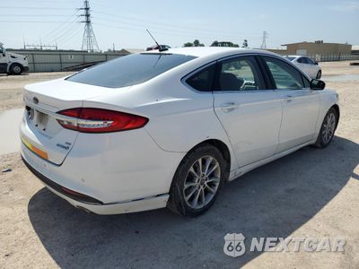 Trzecie zdjęcie samochodu z tyłu: 2017 FORD FUSION SE HYBRID VIN:3FA6P0LU7HR409103 - miniatura