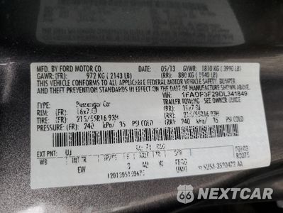 Zdjęcie 12 z 12 samochodu: 2013 FORD FOCUS SE VIN:1FADP3F29DL341849 - miniatura