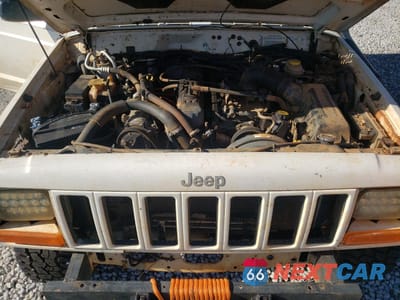 Zdjęcie 11 z 14 samochodu: 2000 JEEP CHEROKEE SPORT VIN:1J4FF48S0YL231653 - miniatura