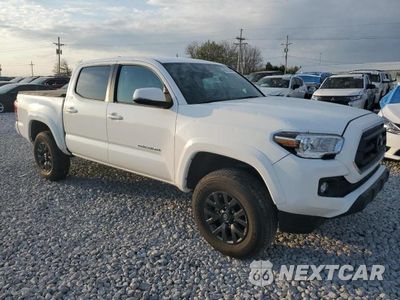 Czwarte zdjęcie samochodu z boku: 2023 TOYOTA TACOMA DOUBLE CAB VIN:3TMCZ5AN1PM635777 - miniatura