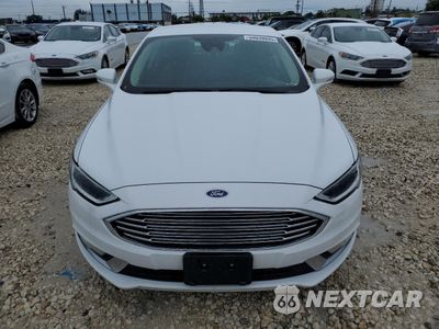 Piąte zdjęcie samochodu w środku: 2017 FORD FUSION SE HYBRID VIN:3FA6P0LU6HR359598 - miniatura