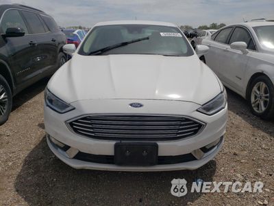 Piąte zdjęcie samochodu w środku: 2017 FORD FUSION SE HYBRID VIN:3FA6P0LU8HR410065 - miniatura