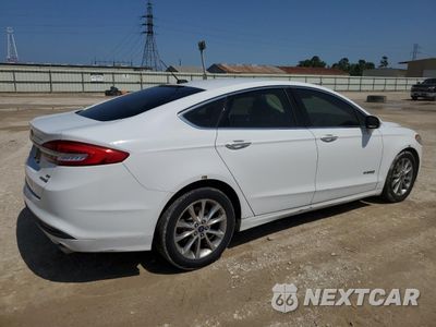 Trzecie zdjęcie samochodu z tyłu: 2017 FORD FUSION SE HYBRID VIN:3FA6P0LU8HR409028 - miniatura