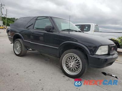 Czwarte zdjęcie samochodu z boku: 2000 GMC JIMMY VIN:1GKCS18W2YK221142 - miniatura