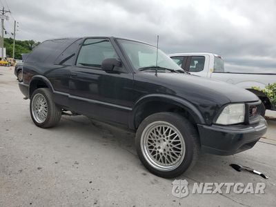 Czwarte zdjęcie samochodu z boku: 2000 GMC JIMMY VIN:1GKCS18W2YK221142 - miniatura