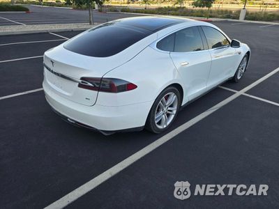 Czwarte zdjęcie samochodu z boku: 2012 TESLA MODEL S VIN:5YJSA1CN1CFP02658 - miniatura