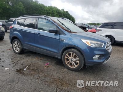Czwarte zdjęcie samochodu z boku: 2018 FORD ESCAPE SE VIN:1FMCU0GDXJUC40737 - miniatura