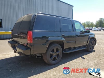 Trzecie zdjęcie samochodu z tyłu: 1999 GMC DENALI VIN:1GKEK13R7XR905572 - miniatura