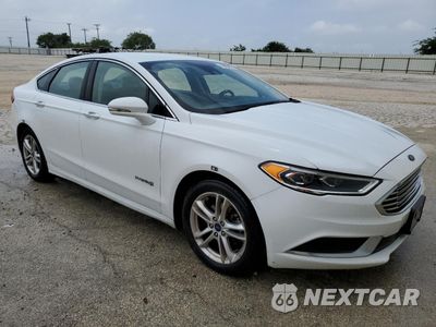 Czwarte zdjęcie samochodu z boku: 2018 FORD FUSION SE HYBRID VIN:3FA6P0LU6JR129968 - miniatura