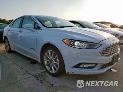 Czwarte zdjęcie samochodu z boku: 2017 FORD FUSION SE HYBRID VIN:3FA6P0LU7HR409649 - miniatura
