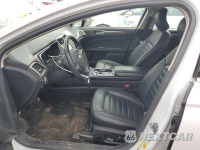 Zdjęcie 7 z 13 samochodu: 2017 FORD FUSION SE HYBRID VIN:3FA6P0LU5HR409066 - miniatura