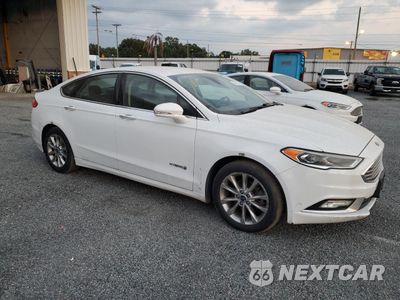 Czwarte zdjęcie samochodu z boku: 2017 FORD FUSION SE HYBRID VIN:3FA6P0LU3HR359607 - miniatura