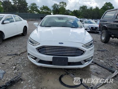Piąte zdjęcie samochodu w środku: 2017 FORD FUSION SE HYBRID VIN:3FA6P0LU8HR409515 - miniatura