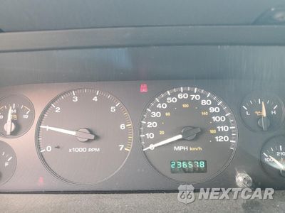 Zdjęcie 9 z 12 samochodu: 2002 JEEP GRAND CHEROKEE LAREDO VIN:1J4GW48S02C255818 - miniatura