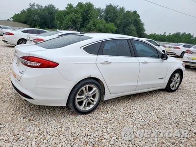 Trzecie zdjęcie samochodu z tyłu: 2018 FORD FUSION SE HYBRID VIN:3FA6P0LU9JR171809 - miniatura