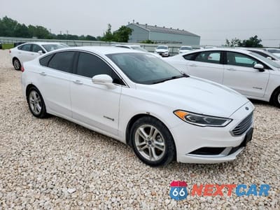 Czwarte zdjęcie samochodu z boku: 2018 FORD FUSION SE HYBRID VIN:3FA6P0LU9JR171809 - miniatura