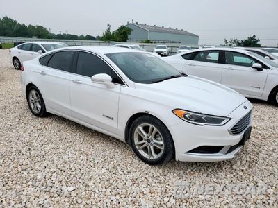 Czwarte zdjęcie samochodu z boku: 2018 FORD FUSION SE HYBRID VIN:3FA6P0LU9JR171809 - miniatura