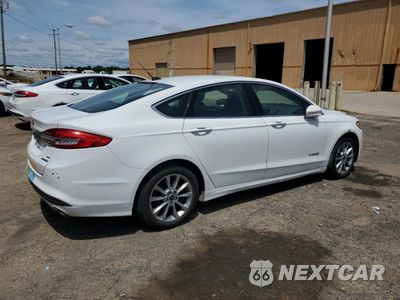 Trzecie zdjęcie samochodu z tyłu: 2017 FORD FUSION SE HYBRID VIN:3FA6P0LU6HR409268 - miniatura
