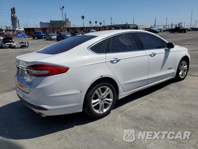 Trzecie zdjęcie samochodu z tyłu: 2018 FORD FUSION SE HYBRID VIN:3FA6P0LU4JR118676 - miniatura