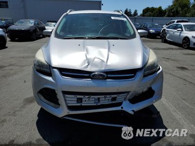 Piąte zdjęcie samochodu w środku: 2015 FORD ESCAPE TITANIUM VIN:1FMCU0J93FUA28676 - miniatura