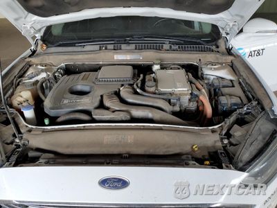 Zdjęcie 11 z 12 samochodu: 2017 FORD FUSION SE HYBRID VIN:3FA6P0LU5HR409181 - miniatura