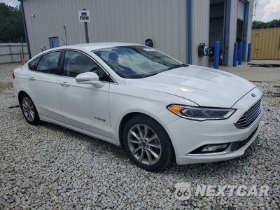 Czwarte zdjęcie samochodu z boku: 2017 FORD FUSION SE HYBRID VIN:3FA6P0LU3HR359641 - miniatura