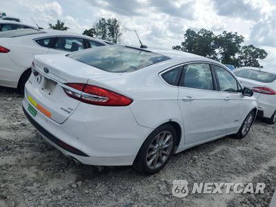 Trzecie zdjęcie samochodu z tyłu: 2017 FORD FUSION SE HYBRID VIN:3FA6P0LUXHR359667 - miniatura