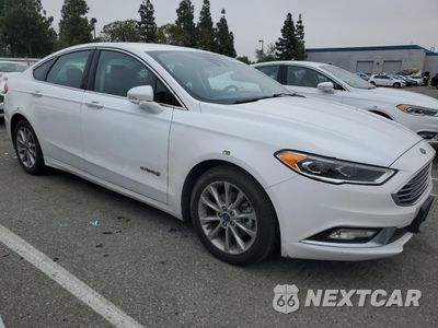 Czwarte zdjęcie samochodu z boku: 2017 FORD FUSION SE HYBRID VIN:3FA6P0LU1HR409727 - miniatura