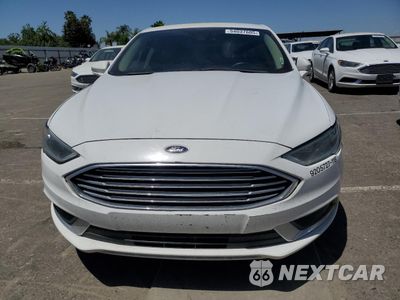 Piąte zdjęcie samochodu w środku: 2018 FORD FUSION SE HYBRID VIN:3FA6P0LU8JR171543 - miniatura