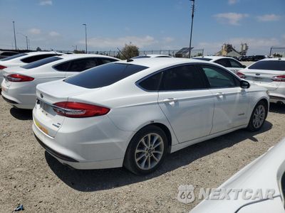 Trzecie zdjęcie samochodu z tyłu: 2017 FORD FUSION SE HYBRID VIN:3FA6P0LU8HR409711 - miniatura