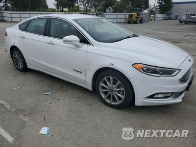 Czwarte zdjęcie samochodu z boku: 2017 FORD FUSION SE HYBRID VIN:3FA6P0LUXHR409757 - miniatura