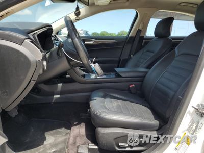 Zdjęcie 7 z 12 samochodu: 2017 FORD FUSION SE HYBRID VIN:3FA6P0LU1HR359573 - miniatura
