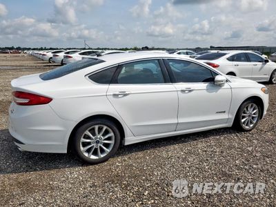 Trzecie zdjęcie samochodu z tyłu: 2017 FORD FUSION SE HYBRID VIN:3FA6P0LU9HR409006 - miniatura
