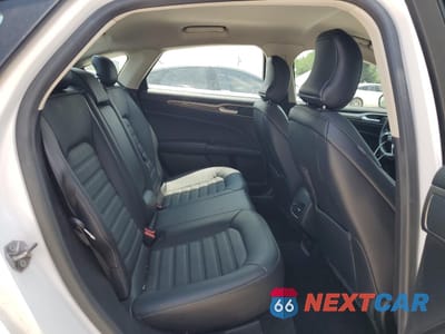 Zdjęcie 10 z 13 samochodu: 2018 FORD FUSION SE HYBRID VIN:3FA6P0LUXJR171575 - miniatura