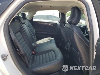 Zdjęcie 10 z 13 samochodu: 2018 FORD FUSION SE HYBRID VIN:3FA6P0LUXJR171575 - miniatura