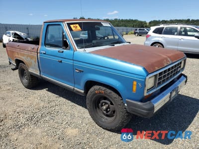 Czwarte zdjęcie samochodu z boku: 1984 FORD RANGER VIN:1FTCR10S2EUD40423 - miniatura