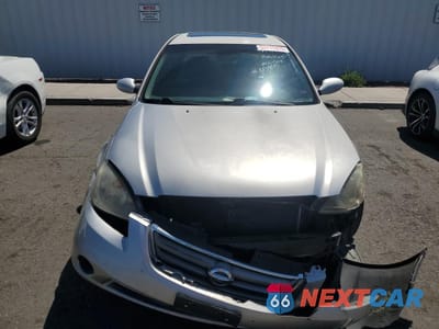 Piąte zdjęcie samochodu w środku: 2003 NISSAN ALTIMA BASE VIN:1N4AL11E13C242591 - miniatura