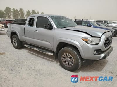 Czwarte zdjęcie samochodu z boku: 2018 TOYOTA TACOMA ACCESS CAB VIN:5TFSZ5AN0JX159874 - miniatura