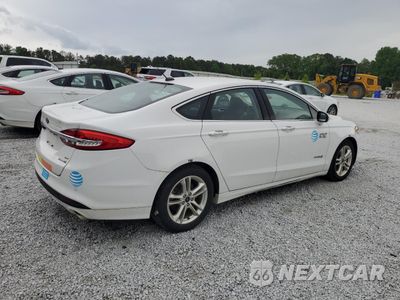 Trzecie zdjęcie samochodu z tyłu: 2018 FORD FUSION SE HYBRID VIN:3FA6P0LU4JR129905 - miniatura
