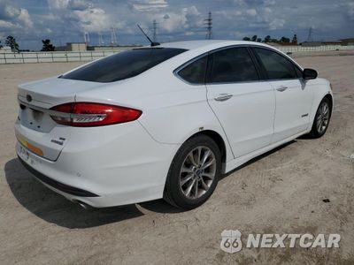 Trzecie zdjęcie samochodu z tyłu: 2017 FORD FUSION SE HYBRID VIN:3FA6P0LU9HR409605 - miniatura