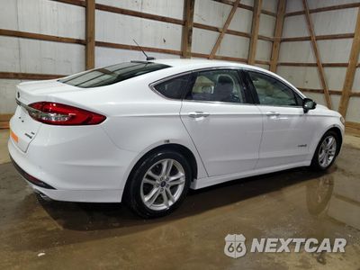 Trzecie zdjęcie samochodu z tyłu: 2018 FORD FUSION SE HYBRID VIN:3FA6P0LU7JR172019 - miniatura