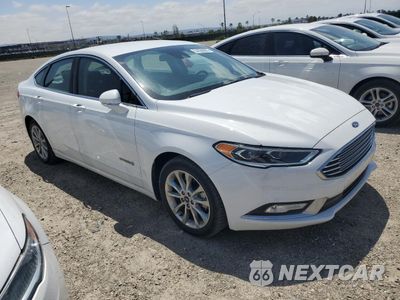 Czwarte zdjęcie samochodu z boku: 2017 FORD FUSION SE HYBRID VIN:3FA6P0LU4HR337468 - miniatura