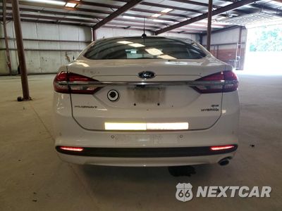 Zdjęcie 6 z 12 samochodu: 2017 FORD FUSION SE HYBRID VIN:3FA6P0LU2HR409526 - miniatura