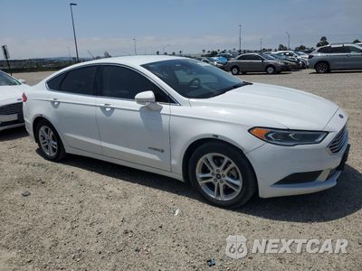 Czwarte zdjęcie samochodu z boku: 2018 FORD FUSION SE HYBRID VIN:3FA6P0LU6JR281863 - miniatura