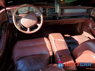 Zdjęcie 8 z 14 samochodu: 1997 BUICK PARK AVENUE ULTRA VIN:1G4CU5210V4611095 - miniatura