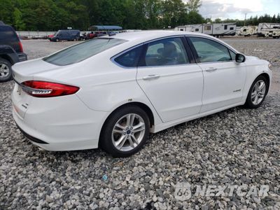 Trzecie zdjęcie samochodu z tyłu: 2018 FORD FUSION SE HYBRID VIN:3FA6P0LU1JR171772 - miniatura