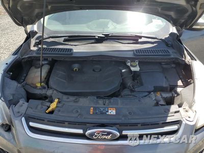 Zdjęcie 12 z 15 samochodu: 2014 FORD ESCAPE TITANIUM VIN:1FMCU0J91EUB04913 - miniatura