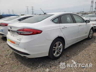 Trzecie zdjęcie samochodu z tyłu: 2018 FORD FUSION SE HYBRID VIN:3FA6P0LU7JR172084 - miniatura