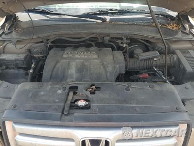 Zdjęcie 12 z 13 samochodu: 2006 HONDA PILOT EX VIN:5FNYF18526B001104 - miniatura