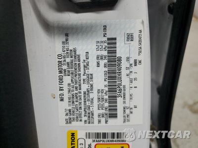Zdjęcie 12 z 13 samochodu: 2017 FORD FUSION SE HYBRID VIN:3FA6P0LUXHR409080 - miniatura